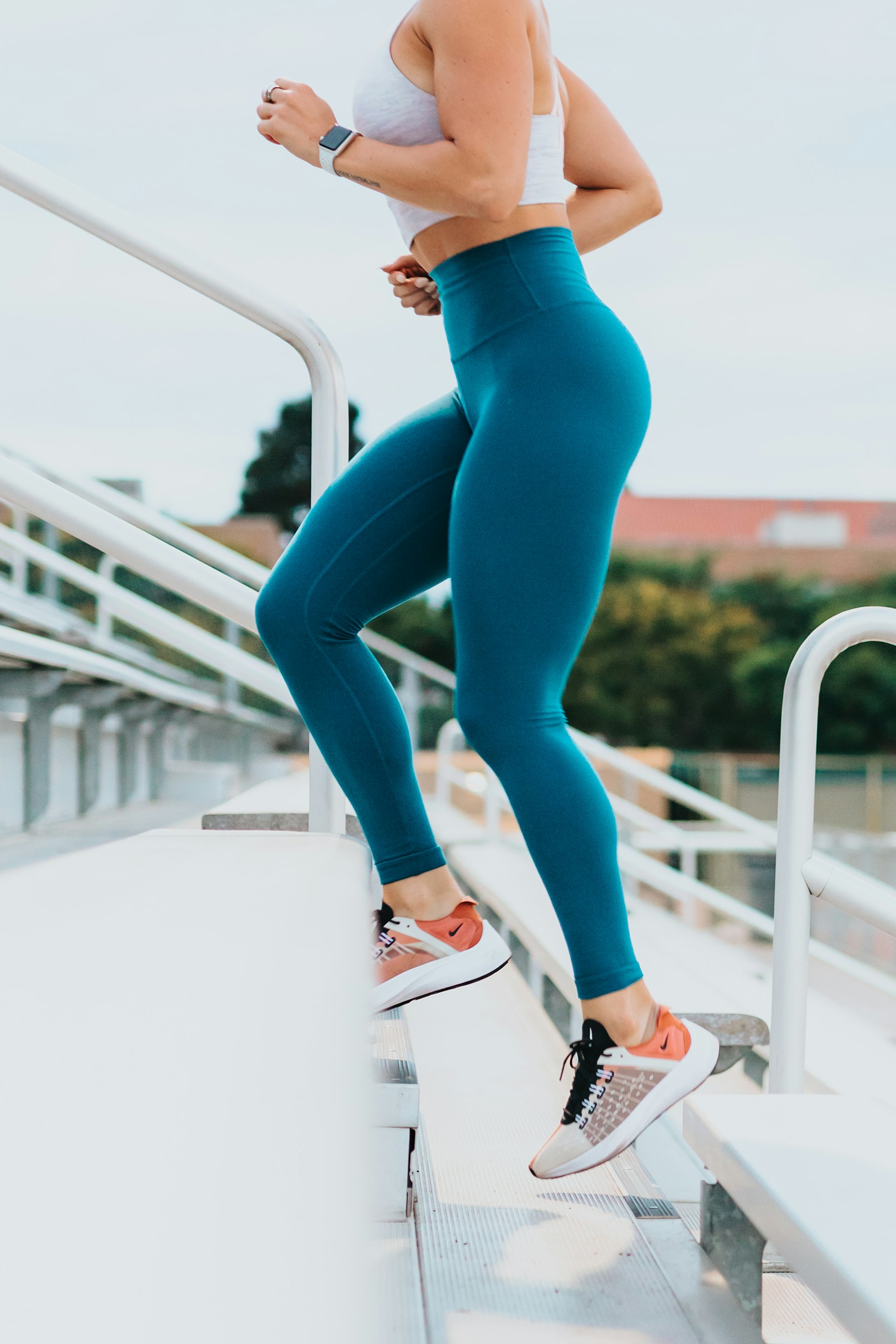 Woman running stairs staying fit and active
